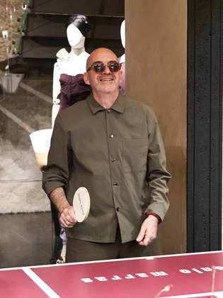 IPA84680225 - Rome, Laila Hasanovic attends the Antonio Marras boutique event. Pictured: Antonio Marras plays ping pong.  Copyright: xMarcoxProvvisionatox xMarcoxProvvisionatox 84680225