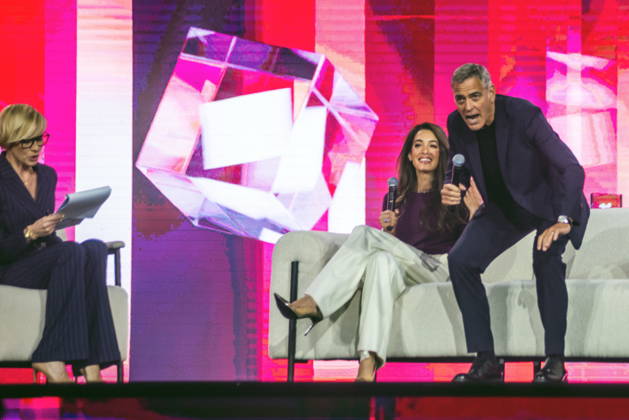 George and Amal Clooney at Impact 26 in Poznan Poznan 13 05 2026 IMPACT 2026 Poznan - conference, a key economic and technological summit in CEE, bringing together leaders of business, politics and science (650+ speakers) at the Poznan International Fair. Pictured: Anita Werner - TVN24 journalist, George Clooney and Amal Clooney 1098872925  1098871819