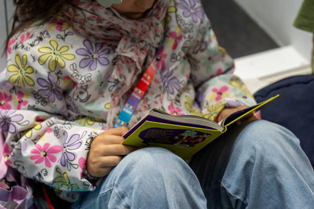 May 15, 2026, Turin, To, Italy: Some moments from the second day of the International Book Fair. Pictured is a little girl reading a book. Turin, May 15, 2026 Turin Italy  - ZUMAa289 20260515_zia_a289_016 Copyright: xSelenexDanielex xAgfx