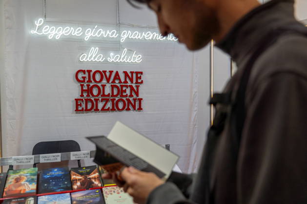 May 15, 2026, Turin, To, Italy: Some moments from the second day of the International Book Fair. Pictured is a boy reading a book. Turin, May 15, 2026 Turin Italy  - ZUMAa289 20260515_zia_a289_009 Copyright: xSelenexDanielex xAgfx