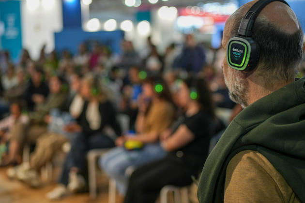 IPA84723876 - Turin. Second day of the 18th edition of the Turin International Book Fair entitled The World Saved by Kids. The fair will remain open from May 14 to 18, 2026 at Lingotto Fiere Pictured: audience listens to audiobooks Copyright: xRiccardoxGiordanox xRiccardoxGiordanox 84723876