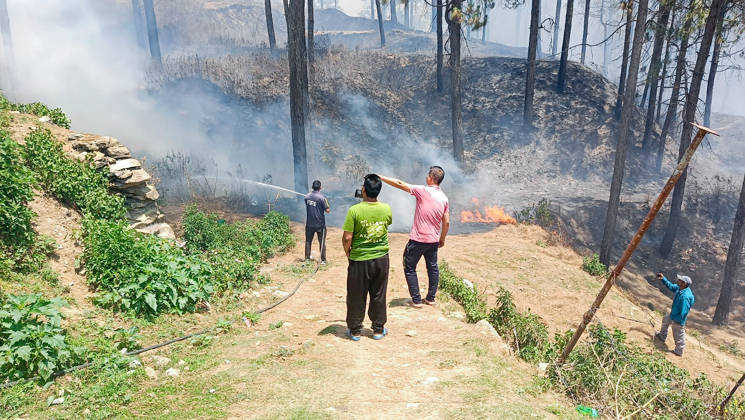 Firefighting operations underway after fire breaks out in a forest Pauri Garhwal, May 21 (ANI): Firefighting operations underway after fire breaks out in a forest, in Pauri Garhwal on Thursday. Pauri Garhwal Uttarakhand India Copyright: xANIx ANI_20260521403