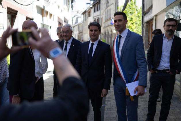 Gabriel Attal Announces his candidacy for the presidential elections - Mur-de-Barrez General Secretary of French centrist party Renaissance Gabriel Attal, Mayor of Mur-de-Barrez Pierre Ignace arrives to delivers a speech during a visit to the village of Mur-de-Barrez in the Aveyron department, southwestern France on May 22, 2026. Former prime minister Gabriel Attal said on May 22, 2026 he was running for president next year. Photo by Raphael Lafargue ABACAPRESS.COM Mur-de-Barrez France  Copyright: xLafarguexRaphael ABACAx