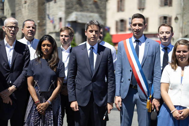 Gabriel Attal Announces his candidacy for the presidential elections - Mur-de-Barrez General Secretary of French centrist party Renaissance Gabriel Attal, Mayor of Mur-de-Barrez Pierre Ignace, Prisca Thevenot sing the Marseillaise after his speech during a visit to the village of Mur-de-Barrez in the Aveyron department, southwestern France on May 22, 2026. Former prime minister Gabriel Attal said on May 22, 2026 he was running for president next year. Photo by Raphael Lafargue ABACAPRESS.COM Mur-de-Barrez France  Copyright: xLafarguexRaphael ABACAx