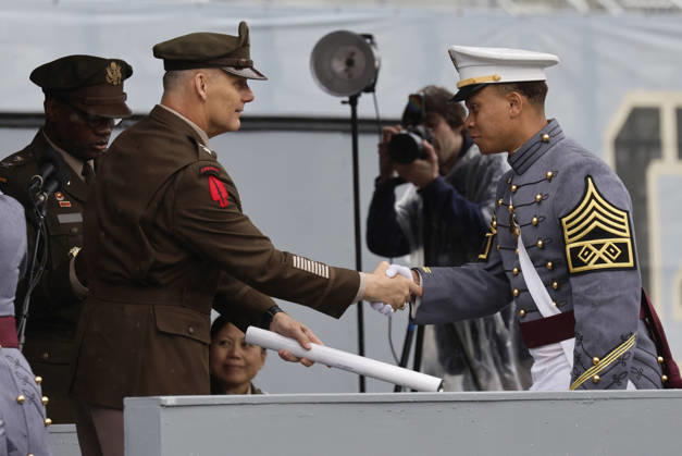 A Graduating Cadet receives his diploma at the West Point Class of 2026 s commencement ceremony in Michie Stadium at the United States Military Academy in West Point, New York on Saturday, May 23, 2026. .  NYP202605239016 PeterxFoley