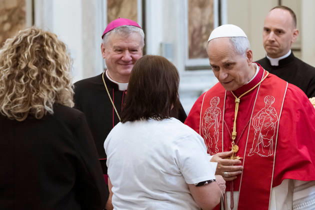 May 23, 2026, Acerra, Napoli, Italy: The Pope seen while talking with a family with victims of pollution. Pope Leo XIV visited Acerra for his patroral itinerary. He was the first Pope to visit the Land of Fires, a region affected by illegal dumping and burning of toxic waste in Campania region in Italy and meet families of victims of pollution in the Cathedral of Santa Maria Assunta in Acerra. Acerra Italy - ZUMAf172 20260523_zip_f172_043 Copyright: xValeriaxFerrarox