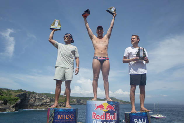 May 23, 2026, Klungkung, Bali, Indonesia: Aidan Heslop (Middle) 1 st, Jonathan Parades (Left) 2st and James Lichtenstein (Right) 3st of celebrates on the podium after winning the Red Bull Cliff Diving World Series at Broken Beach in Nusa Penida, Bali, Indonesia. Klungkung Indonesia - ZUMAp229 20260523_zip_p229_010 Copyright: xLanaxPriatnax