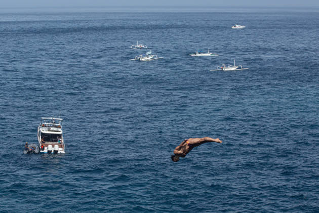 May 23, 2026, Klungkung, Bali, Indonesia: Catalin Preda of Romania dives from the 27-meter platform during the final round of the Red Bull Cliff Diving World Series at Broken Beach in Nusa Penida, Bali, Indonesia. Klungkung Indonesia - ZUMAp229 20260523_zip_p229_012 Copyright: xLanaxPriatnax
