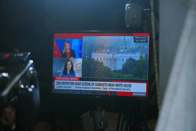 A CNN News report is broadcast on the North Lawn following reports of alleged gun fire near the White House in Washington, DC, US, on Saturday, May 23, 2026. A man was shot by US Secret Service agents near the White House on Saturday after he opened fire with a handgun, according to a person familiar with the matter. Copyright: xAaronxSchwartzx xPoolxviaxCNPx MediaPunchx
