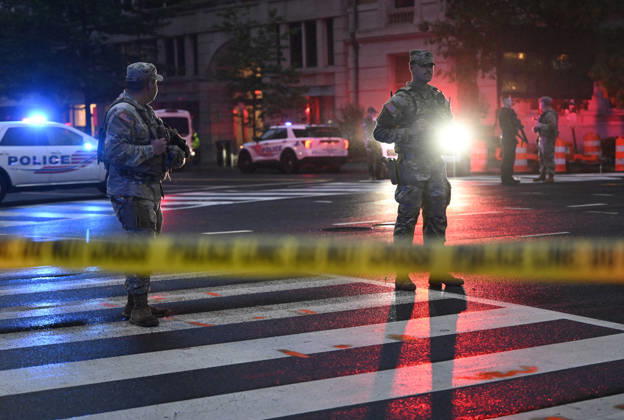 Multiple Shots Fired Half A Block From White House Complex Law enforcement, including members of the National Guard work the scene after multiple rapid-fire gunshots ring out outside the White House on May 23, 2026 in Washington, DC. A suspect was killed after opening fire on a Secret Service checkpoint outside the White House Saturday evening. Photo by Olivier Douliery ABACAPRESS.COM Washington DC United States  Copyright: xDoulieryxOlivier ABACAx