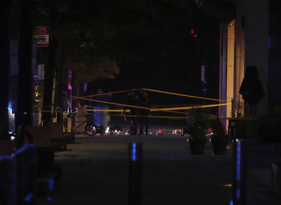 May 23, 2026, Washington, District Of Columbia, USA: Forensic investigators take photos behind a police tape blocking off a crime scene with evidence markers seen on a sidewalk on 17th and Pennsylvania Ave near the White House in Washington, DC, USA on May 23, 2026. Police and security forces swarmed the area around the White House on the evening of May 23 after reports of shots fired. Washington USA - ZUMAs337 20260523_znp_s337_005 Copyright: xGentxShkullakux