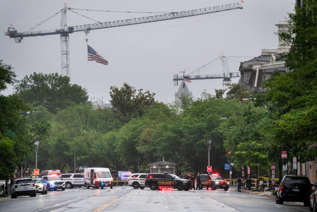May 23, 2026, Washington, Dc, USA: Emergency vehicles crowd the intersection where a gunman fired a volley of shots near the White House before being shot and fatally wounded by U.S. Secret Service police officers. Another person was also injured, according to law enforcement officials. Tower cranes in the background are in use building a new White House ballroom under the direction of President Trump. Washington, DC, May 23, 2026. Photo: Zuma Press Washington USA - ZUMAmj3_ 20260523_zaf_mj3_003 Copyright: xJayxMallinx