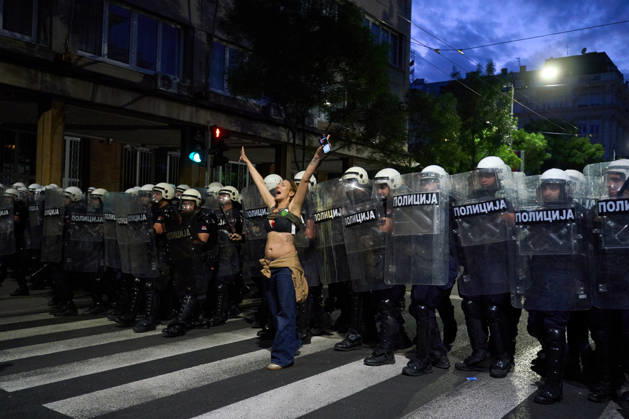 May 23, 2026, Belgrade, Central Serbia, Serbia: 2026523, Belgrade, Serbia - A large number of citizens answer the call of university students and gather to protest in the center of Belgrade. A female demonstrator gestures defiantly while standing in front of a riot police cordon. Belgrade Serbia - ZUMAd223 20260523_zip_d223_013 Copyright: xMarkoxDimicx