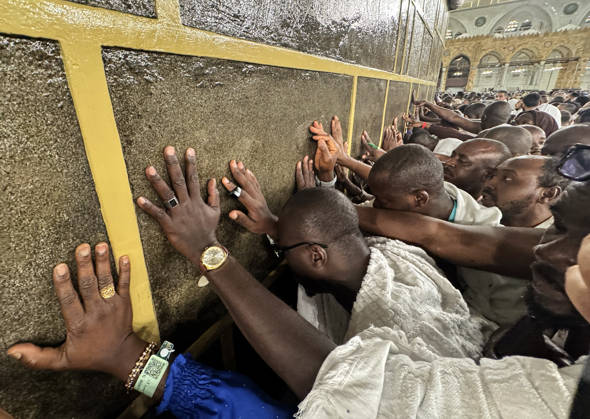 Muslims perform the Hajj pilgrimage MECCA, SAUDI ARABIA - MAY 23: Pilgrims pray while touching the walls of the Kaaba during the Hajj pilgrimage before Eid al-Adha in Mecca, Saudi Arabia on May 23, 2026. Ali Atmaca Anadolu Mecca Saudi Arabia. Editorial use only. Please get in touch for any other usage.  Copyright: x2026xAnadoluxAlixAtmacax