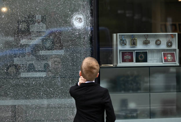 Bullet holes and shattered glass remain at The People s House near White House Complex Bullet holes and shattered glass remain at The People s House, on May 24, 2026, in Washington, DC after the U.S. Secret Service shot a person near the White House on Saturday. On Saturday, May 23, two people were struck in a shooting near the intersection of Pennsylvania Avenue and 17th Street Northwest, located just outside the White House complex. Photo by Olivier Douliery ABACAPRESS.COM Washington DC United States  Copyright: xDoulieryxOlivier ABACAx