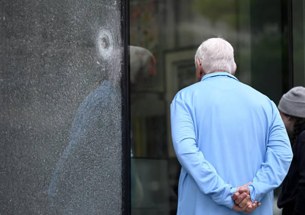 Bullet holes and shattered glass remain at The People s House near White House Complex Bullet holes and shattered glass remain at The People s House, on May 24, 2026, in Washington, DC after the U.S. Secret Service shot a person near the White House on Saturday. On Saturday, May 23, two people were struck in a shooting near the intersection of Pennsylvania Avenue and 17th Street Northwest, located just outside the White House complex. Photo by Olivier Douliery ABACAPRESS.COM Washington DC United States  Copyright: xDoulieryxOlivier ABACAx