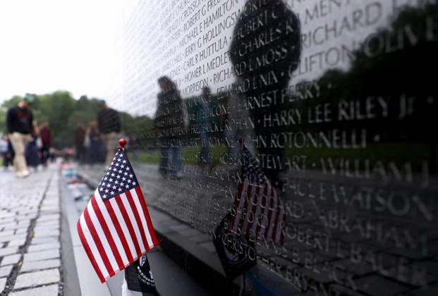 May 24, 2026, Washington, District Of Columbia, USA: Visitors are reflected at the Vietnam Veterans Memorial following the Rolling to Remember ride over Memorial Day weekend in Washington, DC, USA, on May 24, 2026. The Rolling to Remember tradition has been active for 38 years, honouring fallen service members, prisoners of war, and those still missing in action during Memorial Day weekend. Washington USA - ZUMAs337 20260524_znp_s337_044 Copyright: xGentxShkullakux