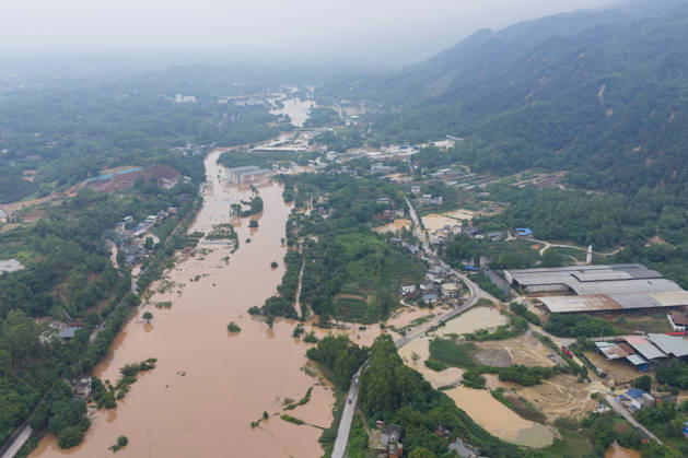 CHONGQING, CHINA - MAY 24: Aerial view of flooded Anxi Village after extreme rainfalls trigger flash floods and geological disasters on May 24, 2026 in Yongchuan District, Chongqing City, China. Devastating rainstorms struck parts of Southwest China s Chongqing over the weekend, resulting in multiple casualties and missing people in the municipality s Yongchuan and Beibei districts. Rescue efforts are ongoing. As of 2:30 pm on May 24, local authorities reported three deaths and 17 people missing in Yongchuan, with another two people missing in Beibei.  Copyright: xChinaxNewsxServicex 111643812906