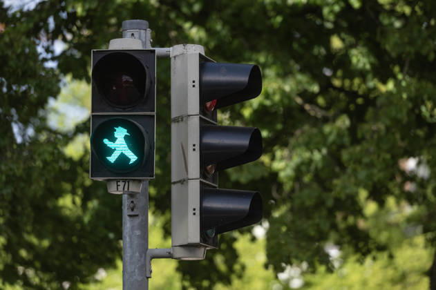 Lübeck Schleswig-Holstein Germany May 2026 Ampelmännchen on a traffic crossing in the centre of the city. Ampelmannchen, man, crossing, east german, ddr, ostalgia, Ampelmann, safety, road,green, grüne,