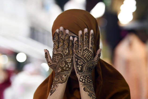 A woman shows her hands adorned with henna ahead of the Eid al-Adha festival Srinagar, May 25 (ANI): A woman shows her hands adorned with henna ahead of the Eid al-Adha festival, in Srinagar on Monday. Srinagar Jammu and Kashmir India Copyright: xANIx ANI_20260525268