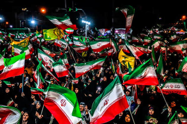May 25, 2026, Iran, Iran: Pro-government supporters wave national flags during a state-organized rally, amid a ceasefire with Iran, the US, and Israel. President Donald Trump issued a fresh warning to Iran on May 17, saying it had to move quickly towards a peace deal or there won t be anything left of them. Washington, locked in conflict with Tehran since US and Israeli forces launched major strikes on the Islamic Republic beginning February 28, has struggled to break an impasse and make any progress toward ending a war that has shaken the Middle East and sent energy prices climbing. Iran s foreign ministry said on May 25, that Tehran was collecting fees for navigational services on ships transiting the strategic Strait of Hormuz, r - ZUMAi98_ 20260525_zih_i98_013 Copyright: xIranianxSupremexLeader SxOfficex
