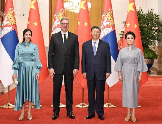 (260525) -- BEIJING, May 25, 2026 -- Chinese President Xi Jinping and his wife Peng Liyuan pose for a group photo with Serbian President Aleksandar Vucic and his wife Tamara Vucic prior to the talks between Xi and Vucic in Beijing, capital of China, May 25, 2026. Xi held talks with Vucic, who is on a state visit to China, at the Great Hall of the People in Beijing on Monday. ) CHINA-BEIJING-XI JINPING-SERBIAN PRESIDENT-TALKS (CN) XiexHuanchi 