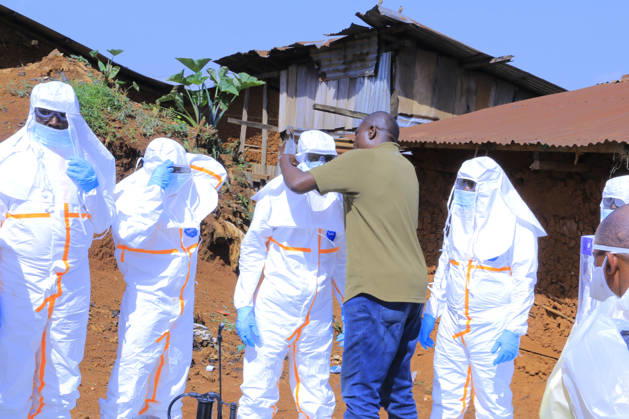 Ebola outbreak in Democratic Republic of Congo MONGBWALU, DEMOCRATIC REPUBLIC OF THE CONGO - MAY 25: Health workers wear protective equipment before transporting the body of a person who died with suspected Ebola infection in Mongbwalu village of Ituri province in eastern Democratic Republic of the Congo, on May 25, 2026. Marcus Loika Anadolu Mongbwalu Democratic Republic of the Congo. Editorial use only. Please get in touch for any other usage. Copyright: x2026xAnadoluxMarcusxLoikax