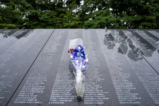 Flowers are left at the Korean War Memorial on Memorial Day in Washington, DC on Monday, May 25, 2026.  WAP20260525329 BONNIExCASH