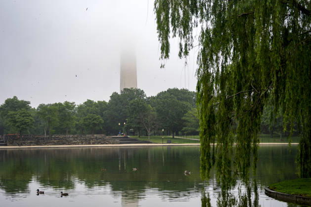The Washington Monument is seen through fog around the Carp Pond on Memorial Day in Washington, DC on Monday, May 25, 2026.  WAP20260525314 BONNIExCASH