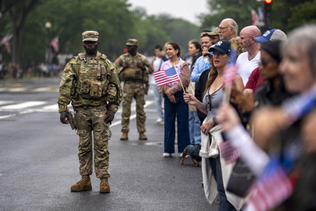 Members of the National Guard patrol the Memorial Day Parade as it passes down Constitution Avenue on Memorial Day in Washington, DC on Monday, May 25, 2026.  WAP20260525316 BONNIExCASH