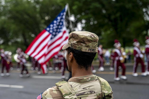 Members of the National Guard patrol the Memorial Day Parade as it passes down Constitution Avenue on Memorial Day in Washington, DC on Monday, May 25, 2026.  WAP20260525337 BONNIExCASH