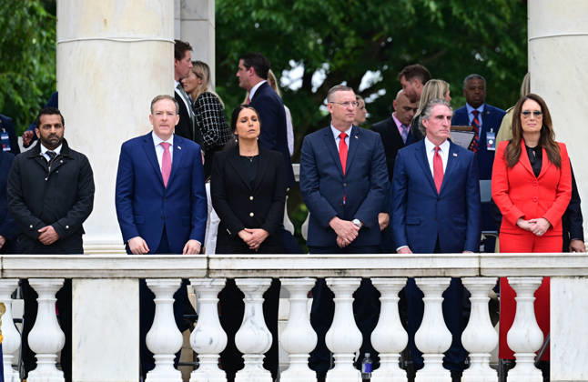 Trump Remarks on Memorial Day at Arlington National Cemetery Members of the Cabinet look on as United States President Donald J Trump delivers remarks in the Amphitheater after laying a wreath at the Tomb of the Unknowns at Arlington National Cemetery in Arlington, Virginia on Memorial Day, Monday, May 25, 2026. From left to right: Kash Patel, Director, Federal Bureau of Investigation (FBI); Lee Zeldin, Director, US Environmental Protection Agency (EPA); Tulsi Gabbard, Director of National Intelligence (DNI); US Secretary of Veterans Affairs Doug Collins; US Secretary of the Interior and Chair, National Energy Council and White House Energy Czar Doug Burgum; and US Secretary of Agriculture Brooke Rollins. Credit: Kyle Mazza Pool via CNP A Copyright: xPool ABACAx