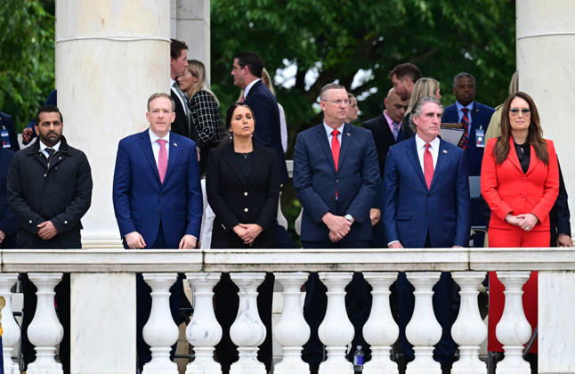 May 25, 2026, Arlington, Virginia, USA: Members of the Cabinet look on as United States President Donald J Trump delivers remarks in the Amphitheater after laying a wreath at the Tomb of the Unknowns at Arlington National Cemetery in Arlington, Virginia on Memorial Day, Monday, May 25, 2026. From left to right: Kash Patel, Director, Federal Bureau of Investigation (FBI); Lee Zeldin, Director, US Environmental Protection Agency (EPA); Tulsi Gabbard, Director of National Intelligence (DNI); US Secretary of Veterans Affairs Doug Collins; US Secretary of the Interior and Chair, National Energy Council and White House Energy Czar Doug Burgum; and US Secretary of Agriculture Brooke Rollins Arlington USA - ZUMAs152 20260525_faa_s152_041 Copyright: xKylexMazzax-xPoolxviaxCNPx