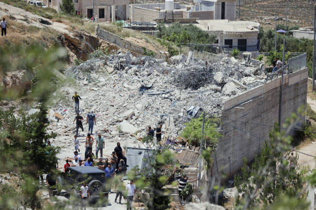 Israeli Demolition West Bank Family Displaced Eid Al-Adha People stand on and around the rubble of a demolished building in Nahhalin, occupied West Bank, on May 25, 2026. The demolition, carried out by Israeli forces who stated the structure was built without a permit, displaced an eight-member Palestinian family just two days before the Islamic holiday of Eid al-Adha. Bethlehem West Bank Palestinian Territories Copyright: xMosabxShawerx