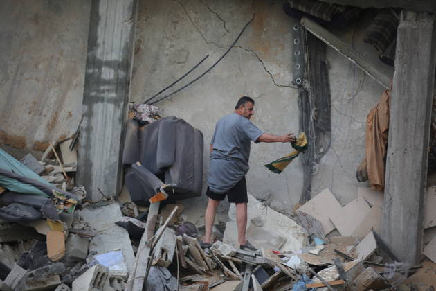 Palestinians inspect damage after Israeli strike in Nuseirat camp Palestinians inspect damage to their homes following an Israeli strike that targeted a house belonging to the al-Tawil family in the Nuseirat refugee camp in the central Gaza Strip on May 25, 2026. The strike destroyed the house completely and caused severe damage to neighboring homes. According to Palestinian medical sources, four Palestinians were wounded in the attack, which came after residents were warned to evacuate the area the previous night. Photo by Hassan al-Jedi apaimages Nusairat Gaza Strip Palestinian Territory 260526_Nuseirat_HJ_00(52).jpeg Copyright: xapaimagesxHassanxal-Jedixx xapaimagesx