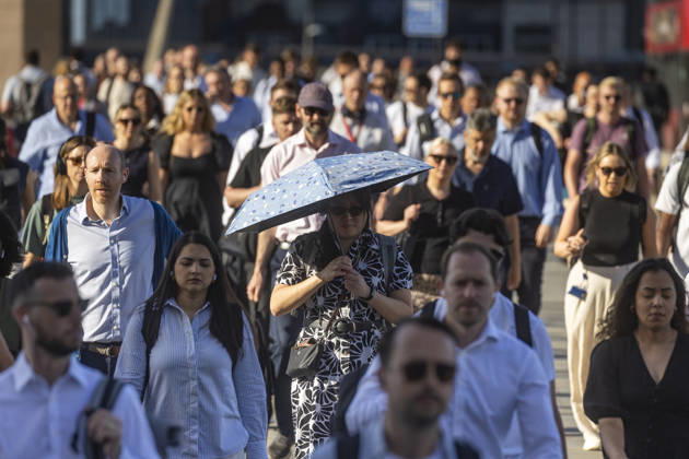 May 26, 2026, London, London, UK: London, UK. Commuters cross London Bridge in central London. According to the weather office, it will be another fine and dry day. High of 35Ã‚Â°C. London UK  - ZUMAl94_ 20260526_zaf_l94_001 Copyright: xMarcinxNowakx