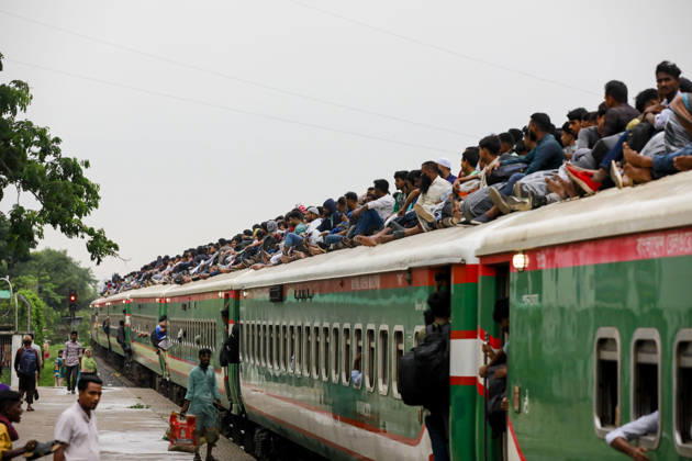 May 26, 2026, Tongi, Bangladesh: Bangladeshi Muslim passengers struggle to board an overcrowded train as they travel home ahead of the upcoming Eid al-Adha festival at a railway station in Tongi, near Dhaka, Bangladesh, Monday, May 26, 2024. Millions of people are expected to leave the capital in one of the countryÃ¢â‚¬â ¢s largest annual holiday exoduses to celebrate Eid with their families in rural areas. Tongi Bangladesh - ZUMAd117 20260526_fap_d117_004 Copyright: xSuvraxKantixDasx