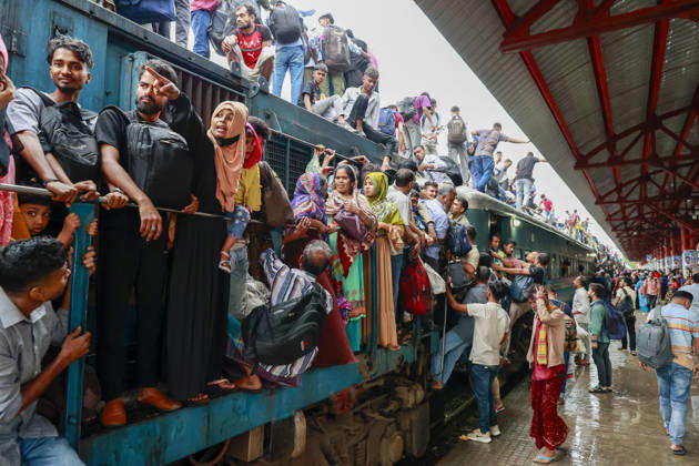 May 26, 2026, Tongi, Bangladesh: Bangladeshi Muslim passengers struggle to board an overcrowded train as they travel home ahead of the upcoming Eid al-Adha festival at a railway station in Tongi, near Dhaka, Bangladesh, Monday, May 26, 2024. Millions of people are expected to leave the capital in one of the countryÃ¢â‚¬â ¢s largest annual holiday exoduses to celebrate Eid with their families in rural areas. Tongi Bangladesh - ZUMAd117 20260526_fap_d117_030 Copyright: xSuvraxKantixDasx