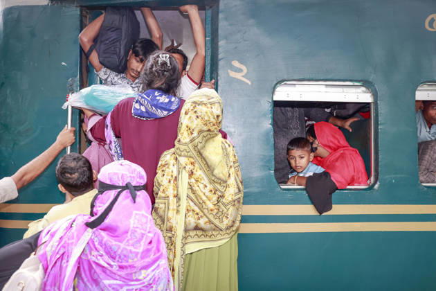 May 26, 2026, Tongi, Bangladesh: Bangladeshi Muslim passengers struggle to board an overcrowded train as they travel home ahead of the upcoming Eid al-Adha festival at a railway station in Tongi, near Dhaka, Bangladesh, Monday, May 26, 2024. Millions of people are expected to leave the capital in one of the countryÃ¢â‚¬â ¢s largest annual holiday exoduses to celebrate Eid with their families in rural areas. Tongi Bangladesh - ZUMAd117 20260526_fap_d117_035 Copyright: xSuvraxKantixDasx
