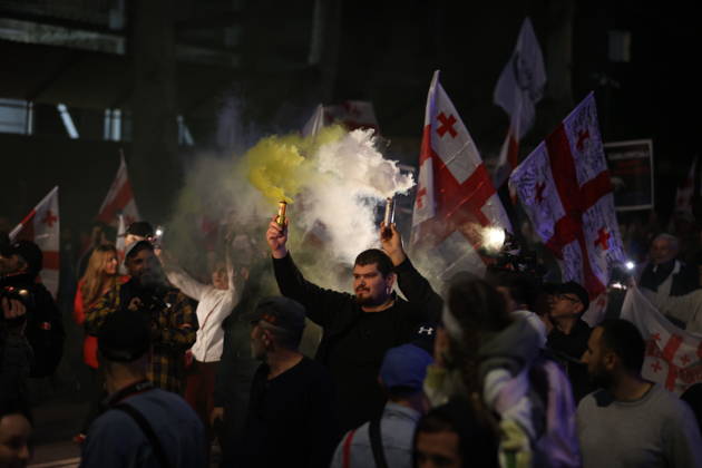 Anti-government protest in Tbilisi TBILISI, GEORGIA - MAY 26: Pro-EU demonstrators wave national flags of Georgia, the European Union, the United States, and Ukraine during an anti-government protest rally outside the Parliament Building on Rustaveli Avenue in Tbilisi, Georgia on May 26, 2026. Organized by the Opposition Alliance , a coalition of various pro-Western opposition political parties, the peaceful demonstration began in the evening hours outside the main entrance of Ivane Javakhishvili Tbilisi State University before marching through the central streets of the capital. Thousands of participants chanted anti-government slogans and accused the ruling party of executing ineffective foreign policies that threaten to derail Georgia s  Copyright: x2026xAnadoluxDavitxKachkachishvilix