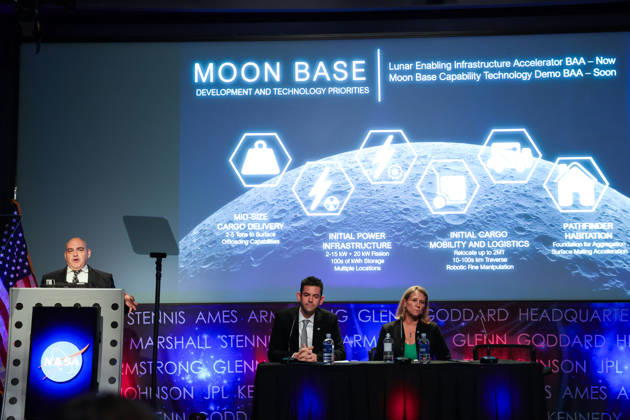 May 26, 2026, Washington, District Of Columbia, USA: Joined onstage by NASA Administrator JARED ISAACMAN and LORI GLAZE, Acting Associate Administrator, Exploration Systems Development Mission Directorate, NASA, CARLOS GARCIA-GALAN, Program Executive, Moon Base, NASA, left at podium, speaks at a press conference announcing Moon Base plans and mission progress at NASA Headquarters in Washington, D.C. on May 26, 2026. NASA s Moon Base program is a long-term lunar exploration and infrastructure initiative designed to enable sustained human presence at the lunar South Pole. Washington USA - ZUMAd227 20260526_znp_d227_011 Copyright: xBryanxDozierx