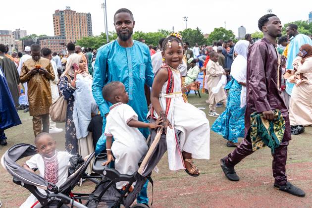 May 27, 2026, New York, New York, USA: People seen after pray and Mayor Zohran Mamdani delivered remarks during Eid Al-Adha holiday prayers at The Yancy Track & Field in New York, NY on May 27, 2026. Hundreds of men, women and children attended wearing clean, colorful and expensive traditional clothes. Eid al-Adha translates from Arabic to Festival of Sacrifice is one of the most important holidays in the Islamic calendar. It honors the Prophet Ibrahim s (Abraham s in Judaism) absolute obedience to God, commemorating his willingness to sacrifice his son as an act of submission before God provided a ram to sacrifice instead. New York USA - ZUMAr339 20260527_znp_r339_011 Copyright: xLevxRadinx