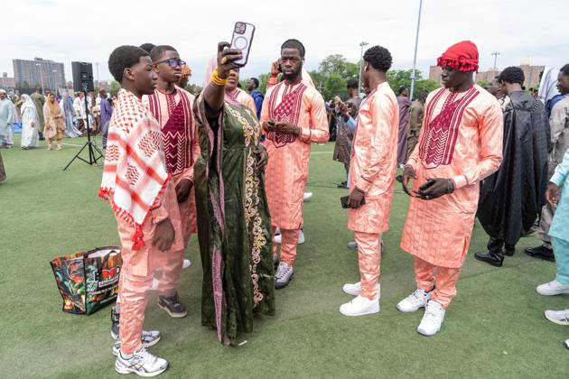 May 27, 2026, New York, New York, USA: People seen after pray and Mayor Zohran Mamdani delivered remarks during Eid Al-Adha holiday prayers at The Yancy Track & Field in New York, NY on May 27, 2026. Hundreds of men, women and children attended wearing clean, colorful and expensive traditional clothes. Eid al-Adha translates from Arabic to Festival of Sacrifice is one of the most important holidays in the Islamic calendar. It honors the Prophet Ibrahim s (Abraham s in Judaism) absolute obedience to God, commemorating his willingness to sacrifice his son as an act of submission before God provided a ram to sacrifice instead. New York USA  - ZUMAr339 20260527_znp_r339_025 Copyright: xLevxRadinx