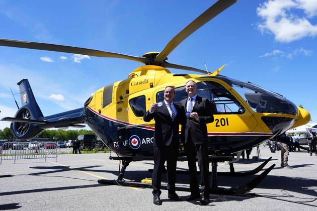 May 27, 2026, Ottawa, On, CANADA: Canada s Minister of National Defence David McGuinty, right, and German s Minister of Defence Boris Pistorius, left, hold patches as they pose with a CT-153 Juno (Airbus H135) helicopter, at the Canadian Association of Defence and Security Industries annual defence industry trade show CANSEC, in Ottawa, on Wednesday, May 27, 2026. Ottawa CANADA - ZUMAc35_ 20260527_zaf_c35_079 Copyright: xJustinxTangx