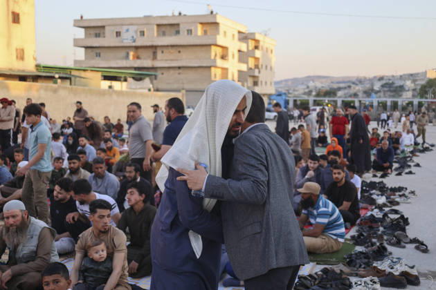 Eid Al-Adha Prayers Idlib Men greet and embrace while gathering for Eid al-Adha prayers in Idlib, Syria, on May 27, 2026. Eid al-Adha, or the Feast of Sacrifice, is one of the most important holidays in the Islamic calendar, commemorating the willingness of Prophet Ibrahim to sacrifice his son. The event is traditionally marked worldwide by communal prayers, family gatherings, acts of charity, and the slaughtering of livestock. Idlib Idlib Syria Copyright: xOmarxAlbawx