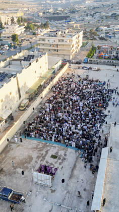 Eid Al-Adha Prayers Idlib An aerial view shows a large crowd of worshipers performing Eid al-Adha prayers in Idlib, Syria, on May 27, 2026. Eid al-Adha, or the Feast of Sacrifice, is one of the most important holidays in the Islamic calendar, commemorating the willingness of Prophet Ibrahim to sacrifice his son. The event is traditionally marked worldwide by communal prayers, family gatherings, acts of charity, and the slaughtering of livestock. Idlib Idlib Syria Copyright: xOmarxAlbawx