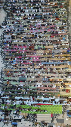 Eid Al-Adha Prayers Idlib An aerial view shows a large crowd of worshipers performing Eid al-Adha prayers in Idlib, Syria, on May 27, 2026. Eid al-Adha, or the Feast of Sacrifice, is one of the most important holidays in the Islamic calendar, commemorating the willingness of Prophet Ibrahim to sacrifice his son. The event is traditionally marked worldwide by communal prayers, family gatherings, acts of charity, and the slaughtering of livestock. Idlib Idlib Syria Copyright: xOmarxAlbawx