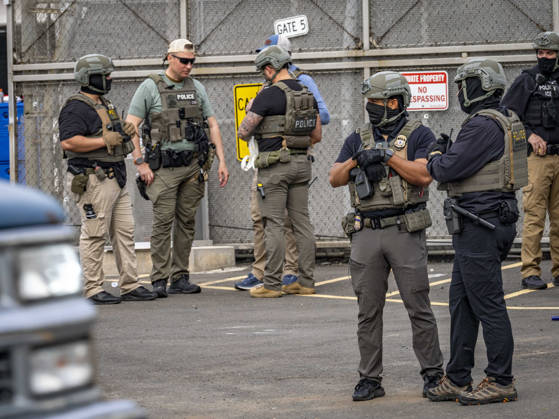 May 27, 2026, Newark, New Jersey, USA: ICE agents wearing bullet-proof vests stand outside of Delaney Hall ICE detention center as detainees inside continue their hunger and labor strike over inhumane conditions and due process violations. Supporters of the detainees are nearby. Newark USA - ZUMAd155 20260527_znp_d155_011 Copyright: xSuexDorfmanx
