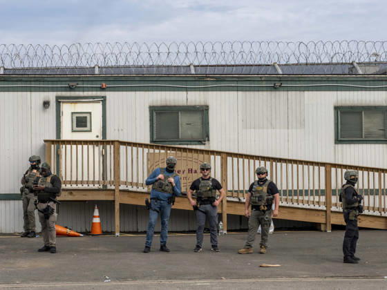 May 27, 2026, Newark, New Jersey, USA: ICE agents wearing bullet-proof vests stand outside of Delaney Hall ICE detention center as detainees inside continue their hunger and labor strike over inhumane conditions and due process violations. Supporters of the detainees are nearby. Newark USA - ZUMAd155 20260527_znp_d155_014 Copyright: xSuexDorfmanx