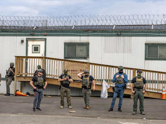 May 27, 2026, Newark, New Jersey, USA: ICE agents wearing bullet-proof vests stand outside of Delaney Hall ICE detention center, some posing for the camera, as detainees inside continue their hunger and labor strike over inhumane conditions and due process violations. Supporters of the detainees are nearby. Newark USA - ZUMAd155 20260527_znp_d155_015 Copyright: xSuexDorfmanx